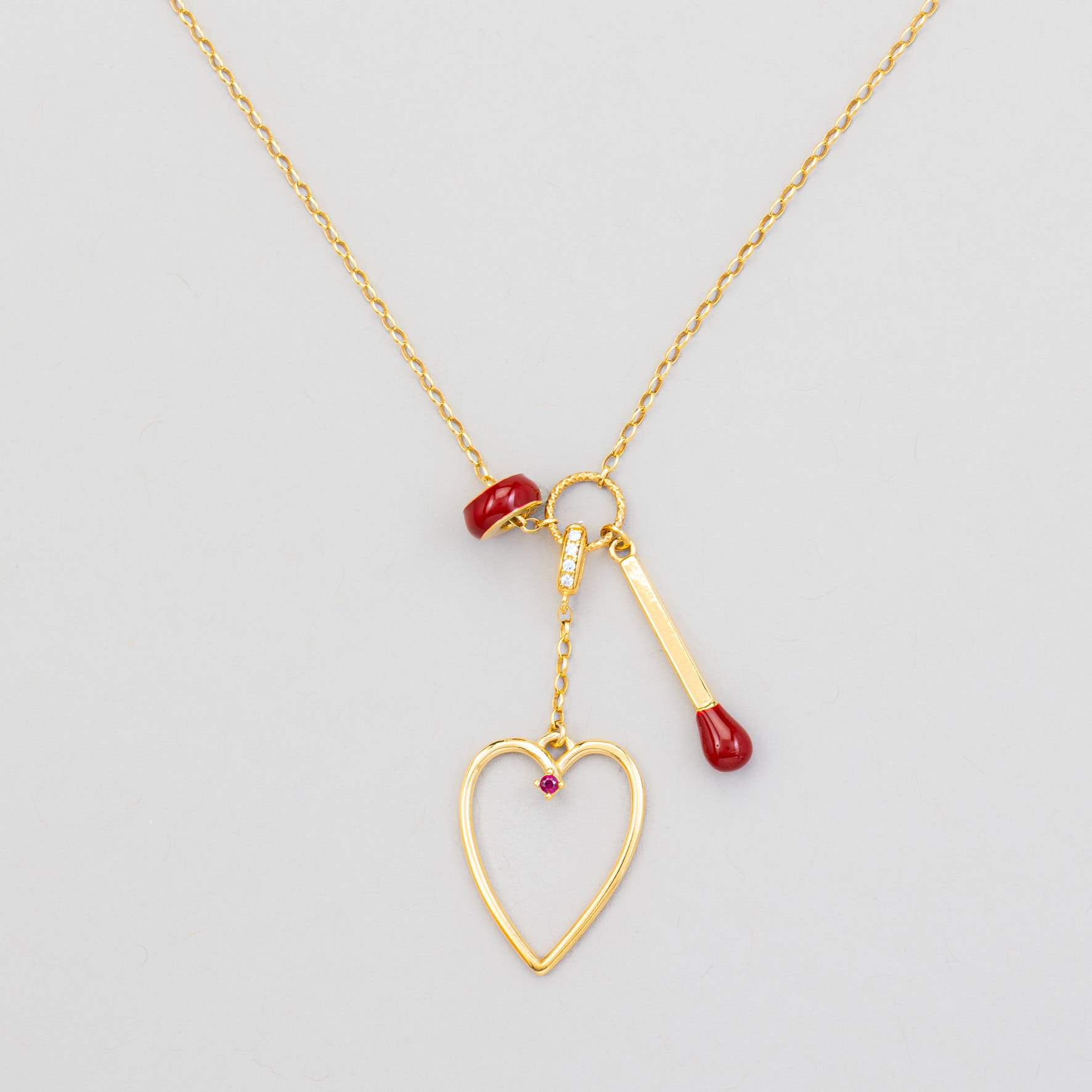 collana cuore con fiammifero